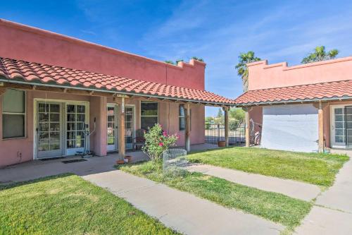 a house with a red roof and a yard at Best Nights Sleep Apt Near Skydive Arizona in Eloy