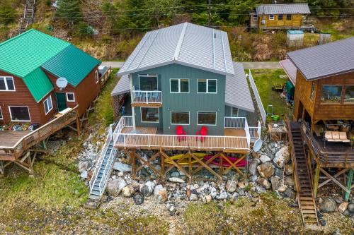 an aerial view of a house with a deck at Remote Island Escape with Breathtaking Views in Tenakee Springs