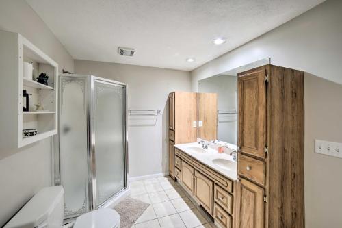 a bathroom with a sink and a shower at Spacious Getaway with Heated Private Pool! in Michigan City
