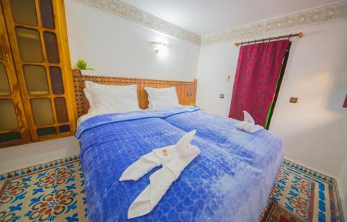 Katil atau katil-katil dalam bilik di Riad Fes Basma