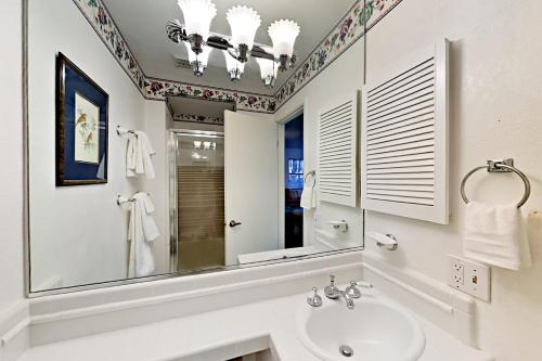 a bathroom with a sink and a mirror at The Summit E3 in South Lake Tahoe