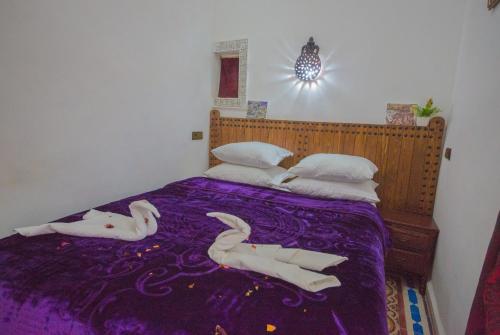 Katil atau katil-katil dalam bilik di Riad Fes Basma