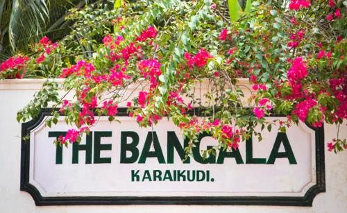 庫魯庫迪的住宿－The Bangala Chettinad，班加拉尔马阿玛尔玛阿玛尔玛阿玛阿玛尔玛阿玛尔玛的标志