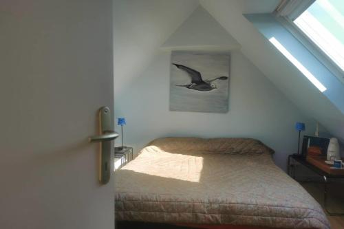Postel nebo postele na pokoji v ubytování Maison de pêcheur - Coucher de soleil en terrasse