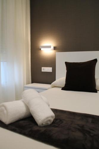 Cama o camas de una habitación en Baixo a Lua Rooming