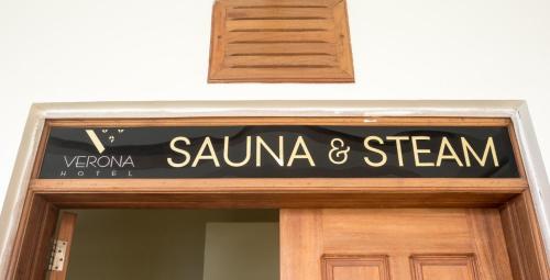 a sign on the door of a building at Verona Hotel and Conference Center in Ruiru