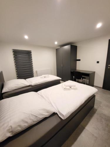 Katil atau katil-katil dalam bilik di Residenz 12