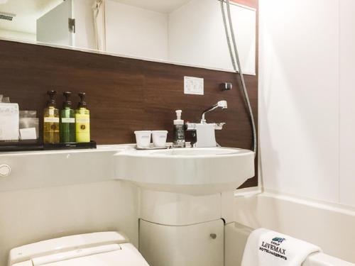 Koupelna v ubytování HOTEL LiVEMAX Yokkaichi Ekimae