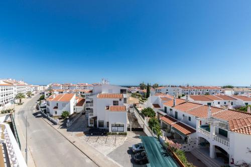 arial view of a city with buildings at Hotel Azul Praia in Altura