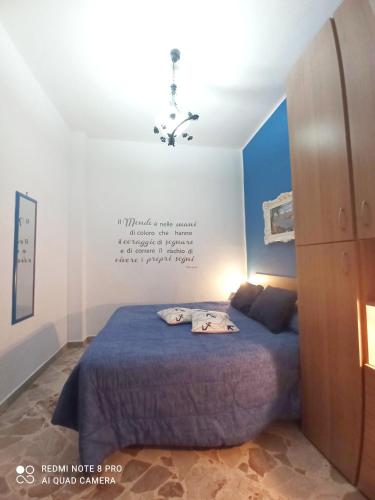 Postel nebo postele na pokoji v ubytování Sicilia bedda 1