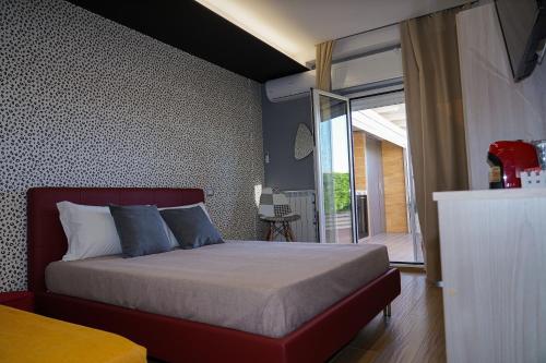 מיטה או מיטות בחדר ב-Maison Lion