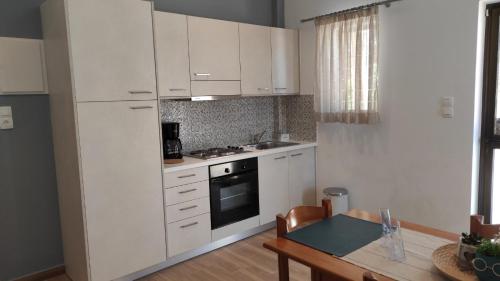 Köök või kööginurk majutusasutuses Soula Apartments & Studios
