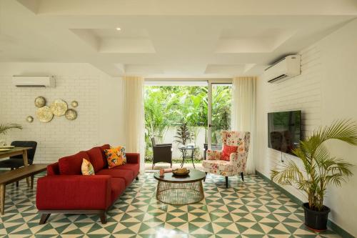 El Tesoro 2BHK Elegant Apartments in Siolim with Pool- 10 mins Drive to Assagaoにあるシーティングエリア