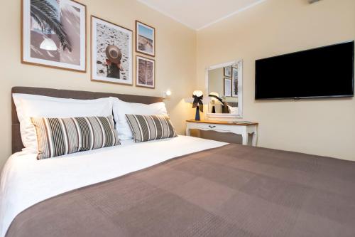 Posteľ alebo postele v izbe v ubytovaní Apartments Villa Istria Rovinj