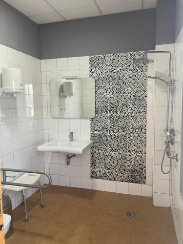 Koupelna v ubytování Albergue Rem