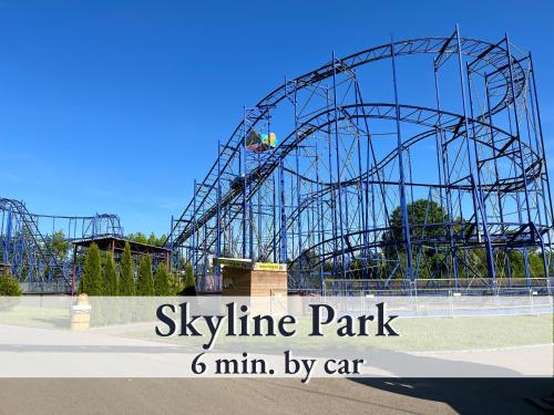 a roller coaster at a theme park with the words skyline park min min at Tolle Zweiraum-Ferienwohnung in bester Lage l Innenstadtnähe l 1 Minute zum Bahnhof l TV l Free-WLAN l Keine Küche l Willkommen im Hallo!-Apartment 4 in Bad Wörishofen