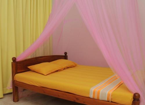 Llit o llits en una habitació de Tissa Resort
