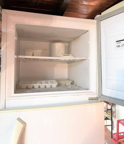 Kuchyň nebo kuchyňský kout v ubytování Casa con PILETA al borde del RIO