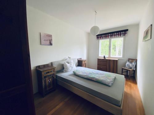 a bedroom with a bed and a window at Casa Vacanze Natura in Mendola