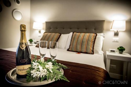 Posteľ alebo postele v izbe v ubytovaní Chic & Town Luxury Rooms
