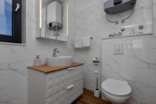 Koupelna v ubytování Apartments IKO