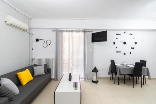 a living room with a couch and a table at K6 Fashion Sparta Apartment in Sparta