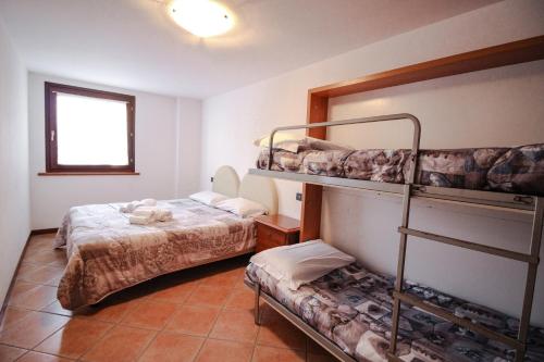 Двох'ярусне ліжко або двоярусні ліжка в номері Residence Aquila - Bilo Monte Rena