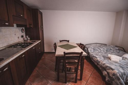 Postel nebo postele na pokoji v ubytování Residence Aquila - Mono Punta Regina