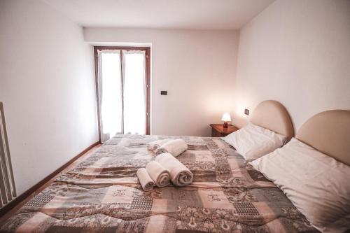 Postel nebo postele na pokoji v ubytování Residence Aquila - Bilo Zerbion