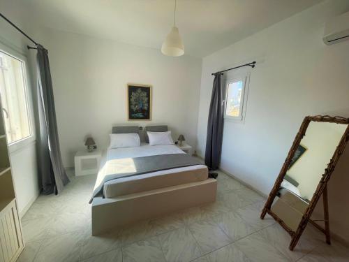 Postel nebo postele na pokoji v ubytování Revel Mykonos 4