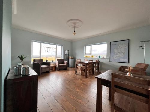 a living room with a couch and a table at Errigal View B&B and Crafts in Fawnaboy Lower