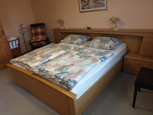 Кровать или кровати в номере Haus Veronika