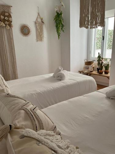 Ένα ή περισσότερα κρεβάτια σε δωμάτιο στο Enjoy Ávila 2 - LA CATEDRAL