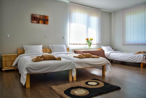 Ένα ή περισσότερα κρεβάτια σε δωμάτιο στο Dariya Guest House
