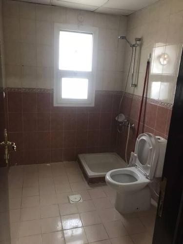 Vonios kambarys apgyvendinimo įstaigoje Apartment in Ajman,furnished studio