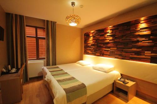 Ayderoom Hotelにあるベッド