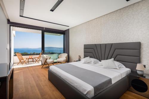 Posteľ alebo postele v izbe v ubytovaní Villa Excellence