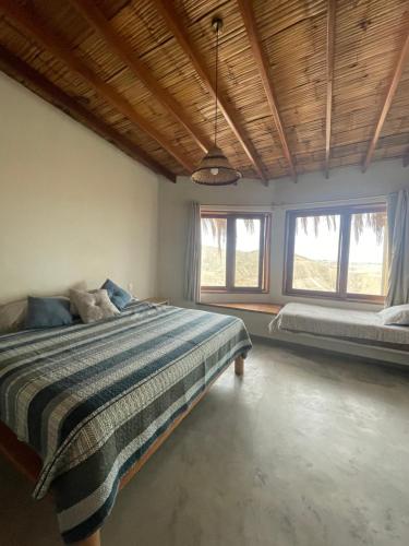 Ένα ή περισσότερα κρεβάτια σε δωμάτιο στο Villas turrutela
