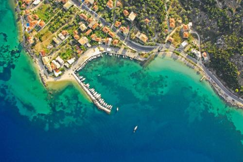an aerial view of a beach and water at Elianthi Luxury Apartments in Nikiana