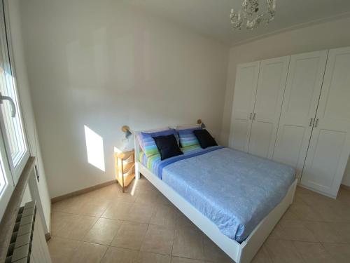 Letto o letti in una camera di Carachouse-Lido di Camaiore, tra pini marini e mare