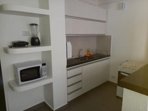 O bucătărie sau chicinetă la Apartamento 1011