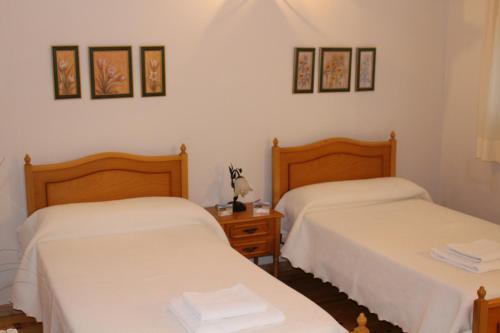 En eller flere senge i et værelse på Los Campos