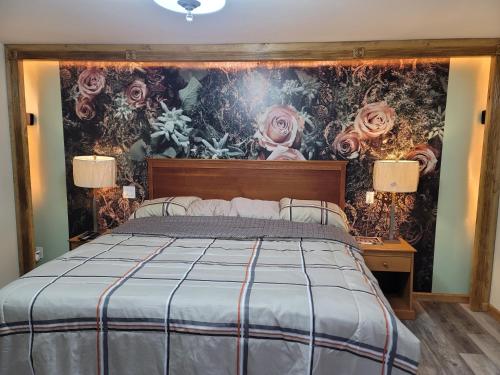 Postel nebo postele na pokoji v ubytování Stardust Motel