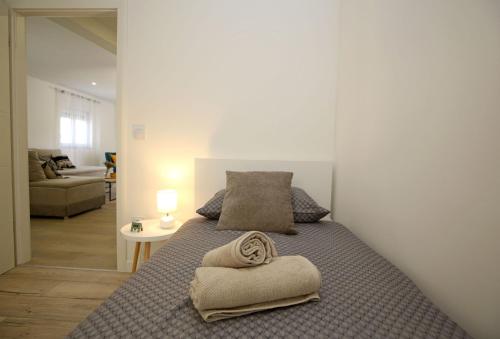 Llit o llits en una habitació de Apartment La Rotonda