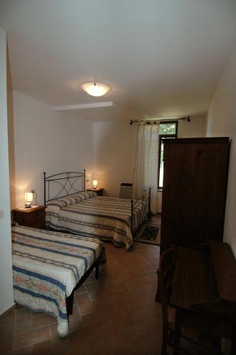 Katil atau katil-katil dalam bilik di Agriturismo San Vincenzo