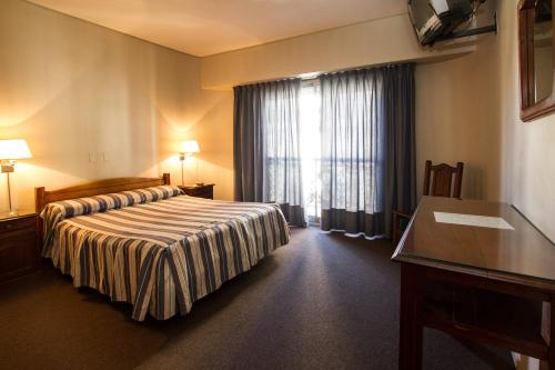 Posteľ alebo postele v izbe v ubytovaní Hotel Marbella