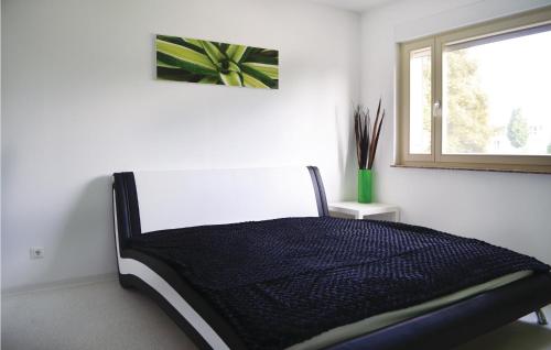 Ein Bett oder Betten in einem Zimmer der Unterkunft Ferienhaus Kreuzbergstr. A