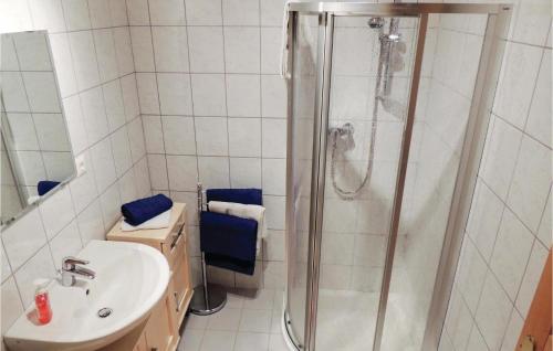 a bathroom with a shower and a sink at Lovely Apartment In Mrtschach With House A Mountain View in Mörtschach