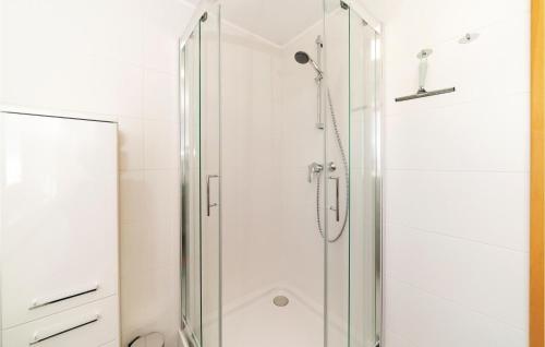 a shower with a glass door in a bathroom at Schoenes Ferienhaus In Eberau in Eberau