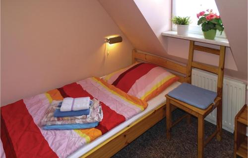 Cozy Apartment In Wismar With Saunaにあるベッド